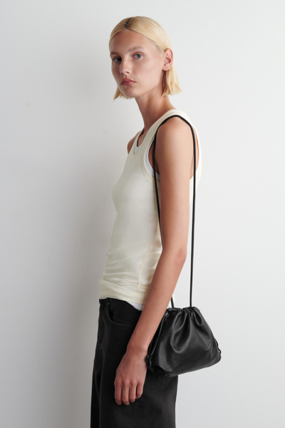 MINI CAVATELLI CLUTCH BAG - LEATHER - BLACK | COS