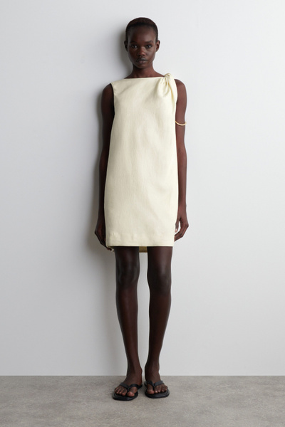 TWIST-DETAIL LINEN MINI DRESS - BUTTER YELLOW | COS US TWIST-DETAIL LINEN MINI DRESS - BUTTER YELLOW | COS US