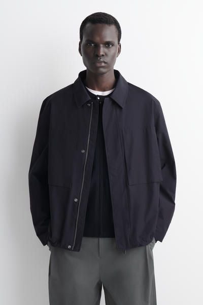 PACKABLE-HOOD WINDBREAKER JACKET - NAVY | COS US