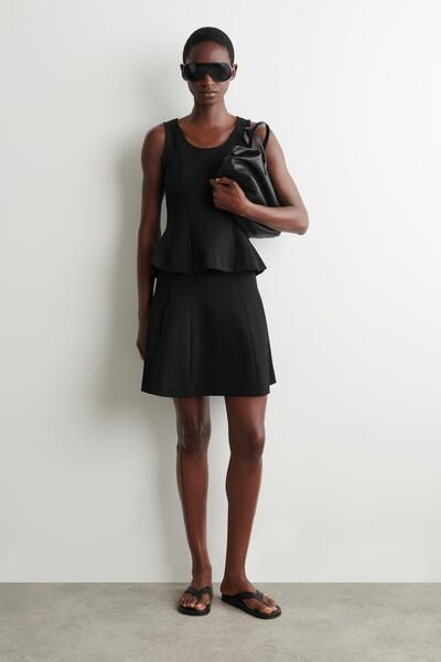 SCULPTED PANELED JERSEY MINI SKIRT - BLACK | COS US