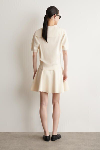 KNITTED FLARED MINI SKIRT - IVORY | COS US